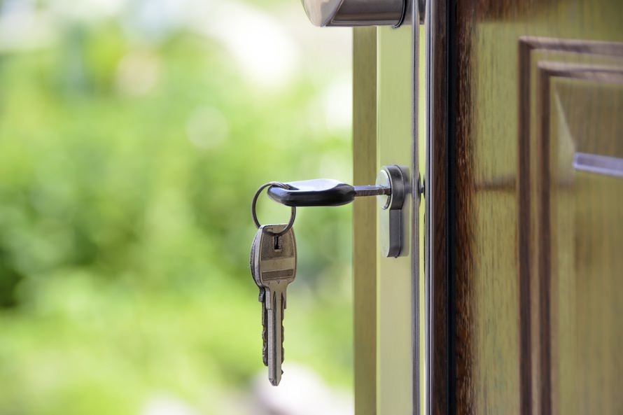 a key in lock of a door