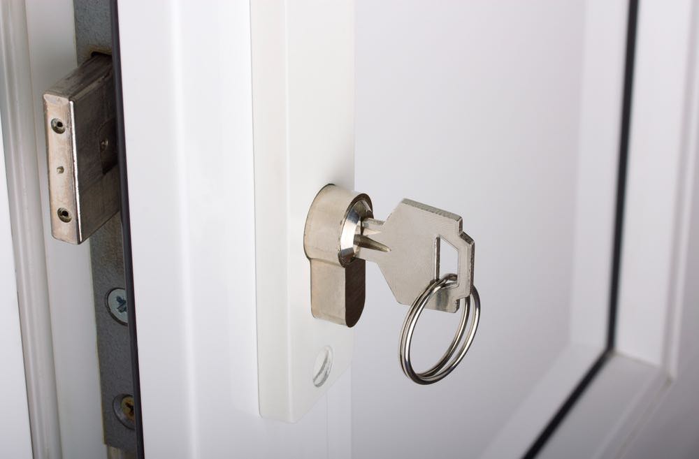a door lock with the key in it