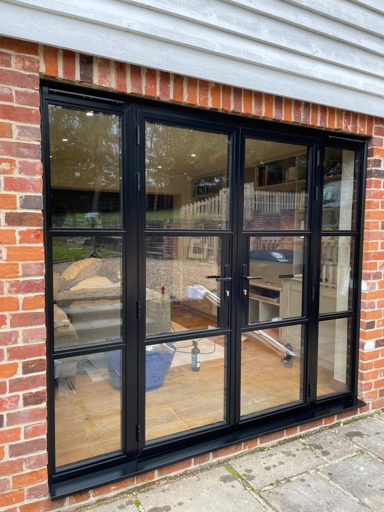 Bi-fold installation in Stansted